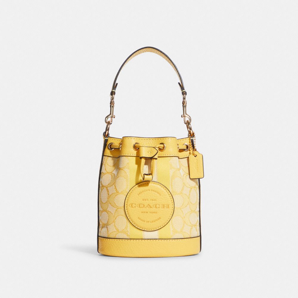 Mini Dempsey Bucket Bag In Signature Jacquard With Stripe And Coach Patch - GOLD/RETRO YELLOW - COACH C8322