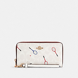 COACH C8385 - Long Zip Around Wallet In Signature Canvas With Racquet Print GOLD/CHALK MULTI