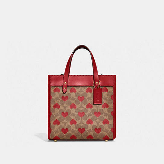 C8391 - Field Tote 22 In Signature Canvas With Heart Print Brass/Tan Red Apple