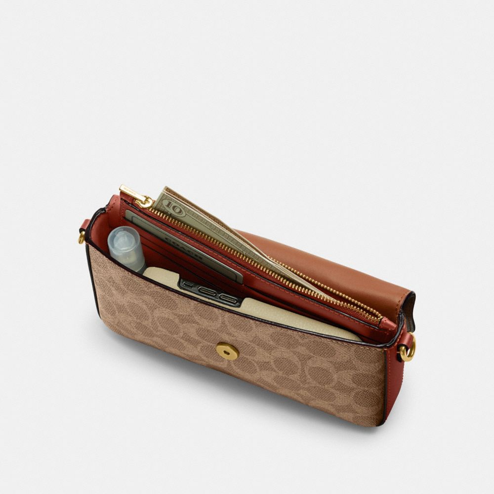 WYN CROSSBODY IN SIGNATURE CANVAS