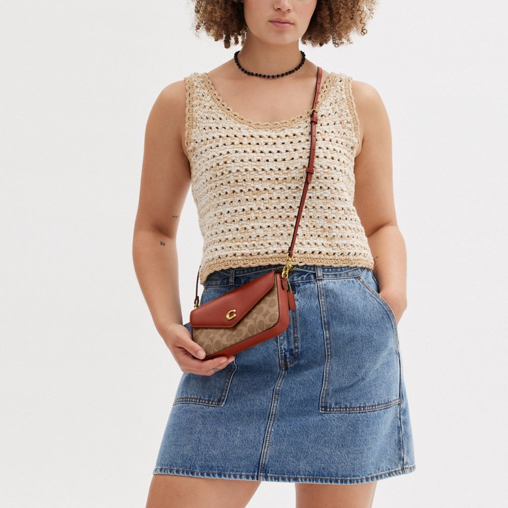 WYN CROSSBODY IN SIGNATURE CANVAS