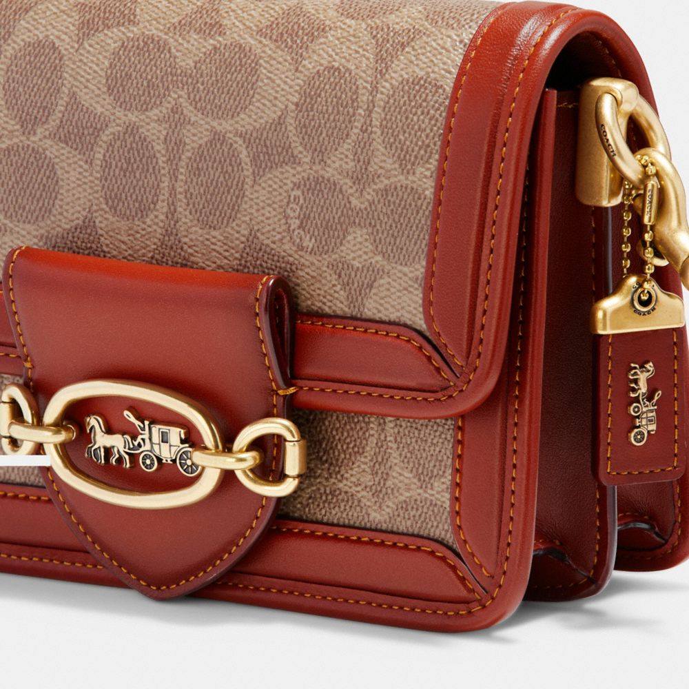 HERO CROSSBODY IN SIGNATURE CANVAS