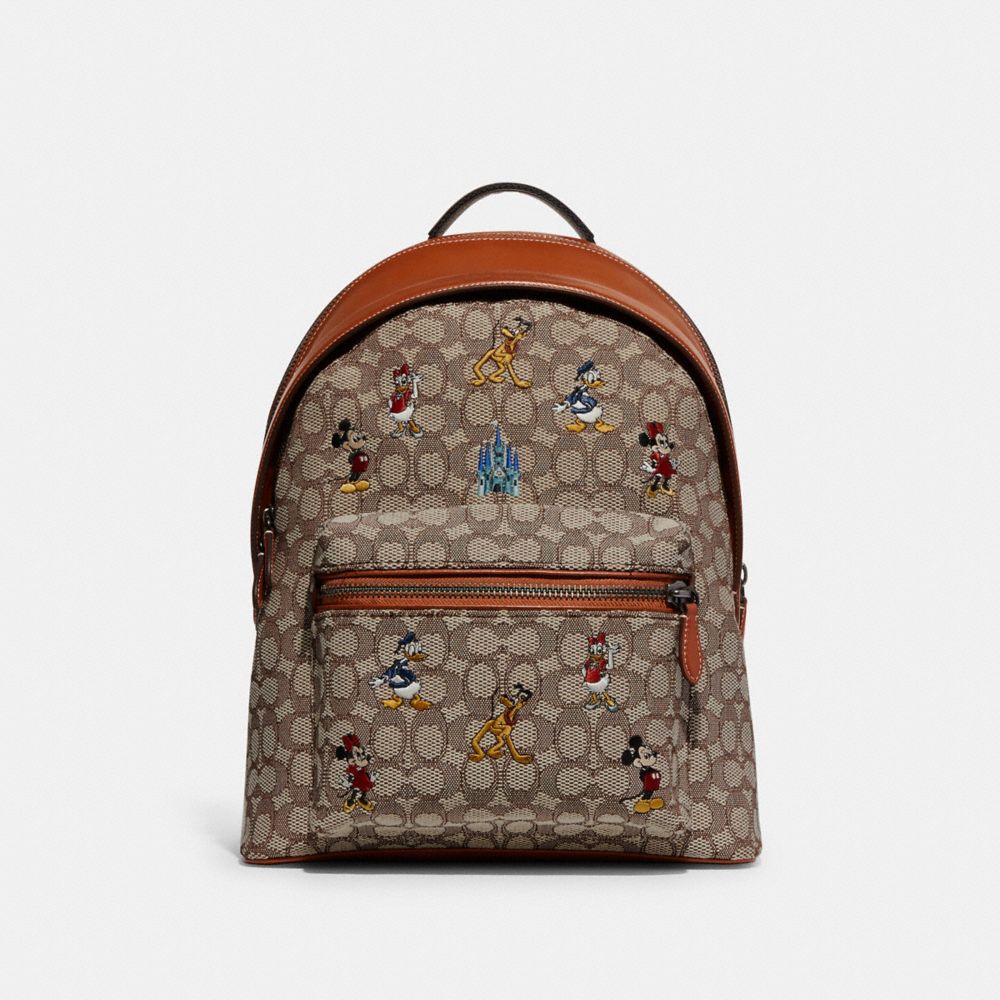 COACH C8490 Disney X Coach Charter Backpack In Signature Textile Jacquard With Mickey Mouse And Friends Embroidery Brass/Cocoa
