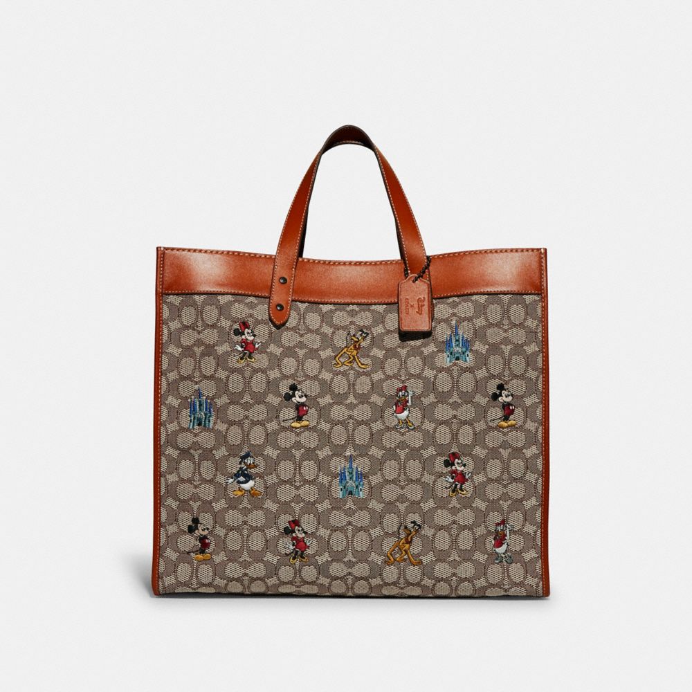 COACH C8492 Disney X Coach Field Tote 40 In Signature Textile Jacquard With Mickey Mouse And Friends Embroidery Brass/Cocoa