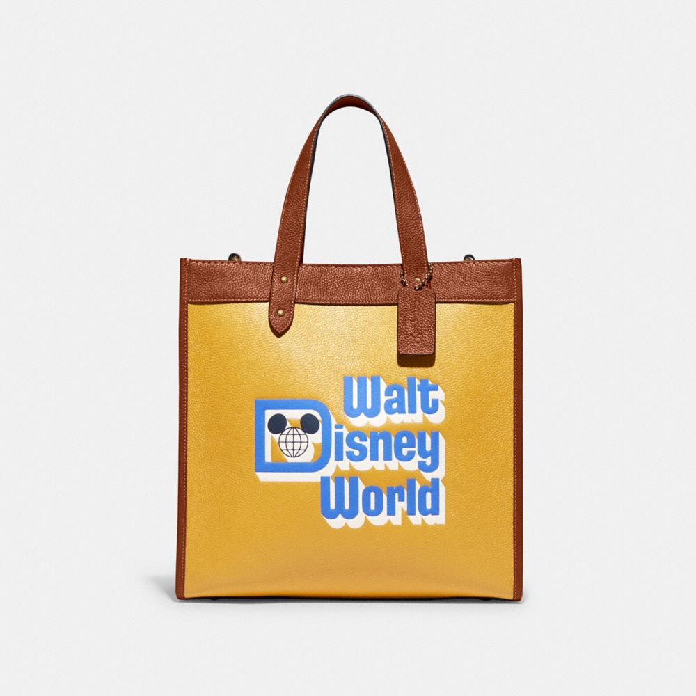 COACH C8551 Disney X Coach Field Tote With Walt Disney World Motif Brass/Honeycomb Multi