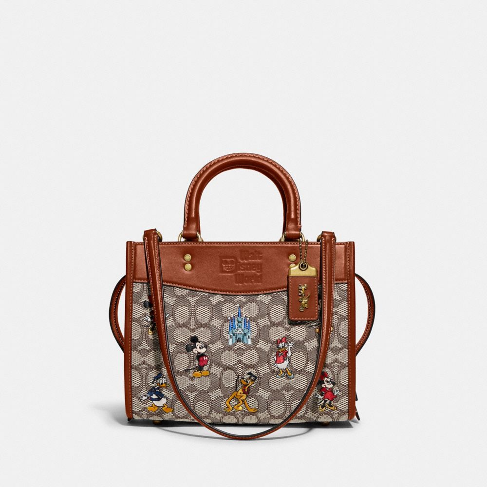 COACH C8553 Disney X Coach Rogue 25 In Signature Textile Jacquard With Mickey Mouse And Friends Embroidery BRASS/COCOA BURNISHED AMBER MULTI