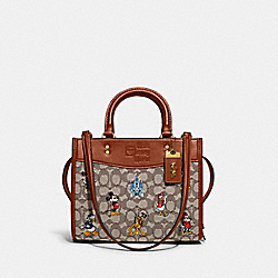 Disney X Coach Rogue 25 In Signature Textile Jacquard With Mickey Mouse And Friends Embroidery - C8553 - Brass/Cocoa Burnished Amber Multi