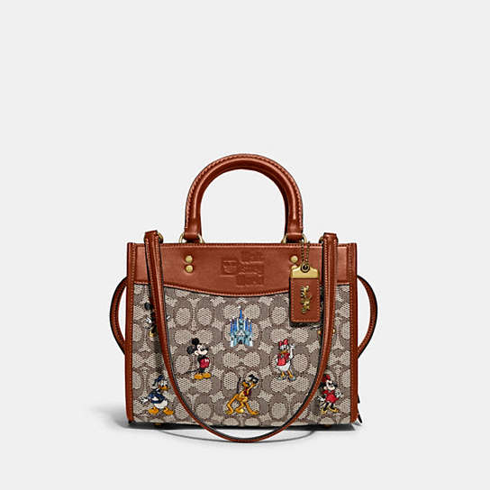 C8553 - Disney X Coach Rogue 25 In Signature Textile Jacquard With Mickey Mouse And Friends Embroidery Brass/Cocoa Burnished Amber Multi
