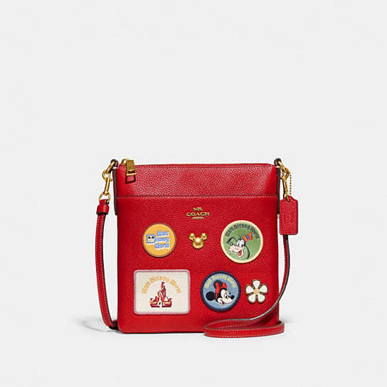 C8574 - Disney X Coach Kitt Messenger Crossbody With Patches Brass/Electric Red