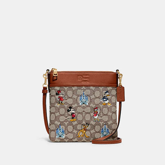 C8575 - Disney X Coach Kitt Messenger Crossbody In Signature Textile Jacquard With Mickey Mouse And Friends Embroidery Brass/Cocoa Burnished Amber Multi