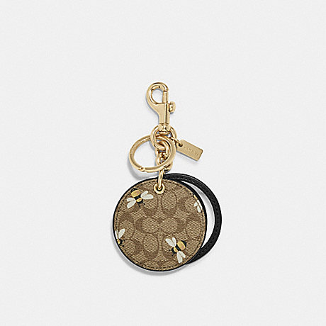 COACH Mirror Bag Charm In Signature Canvas With Bee Print - GOLD/KHAKI YELLOW - C8622