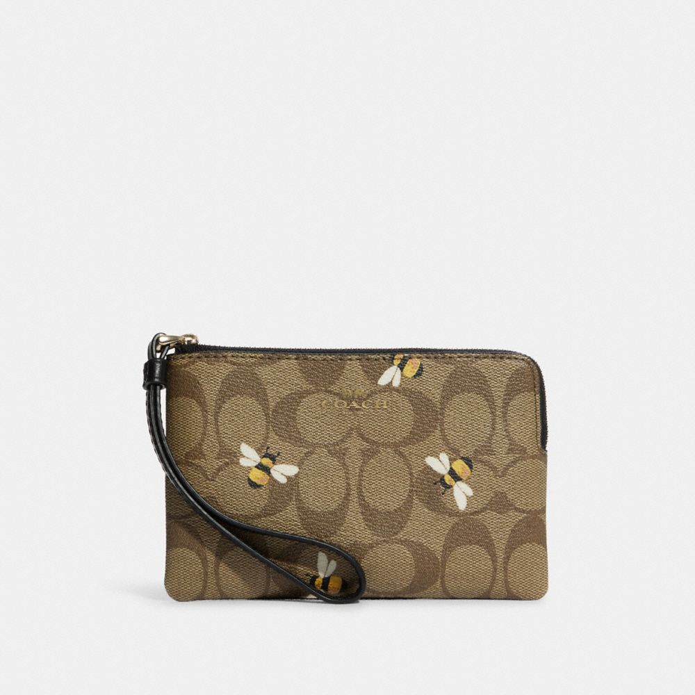 COACH Corner Zip Wristlet In Signature Canvas With Bee Print - GOLD/KHAKI MULTI - C8674