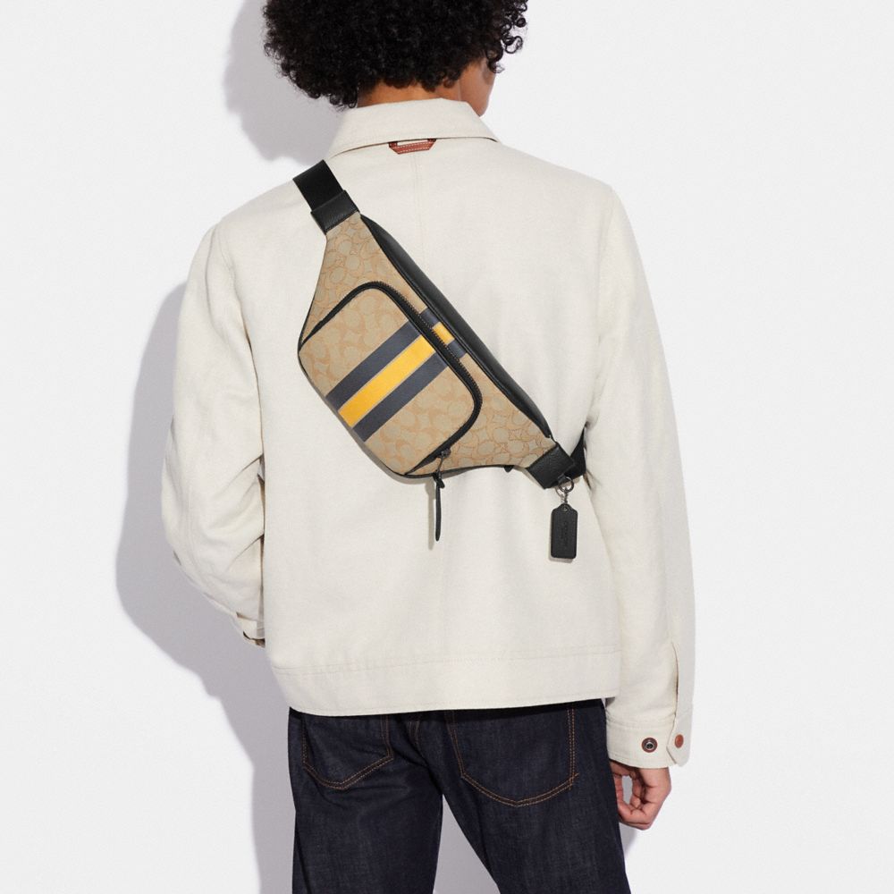 THOMPSON BELT BAG IN SIGNATURE JACQUARD WITH VARSITY STRIPE