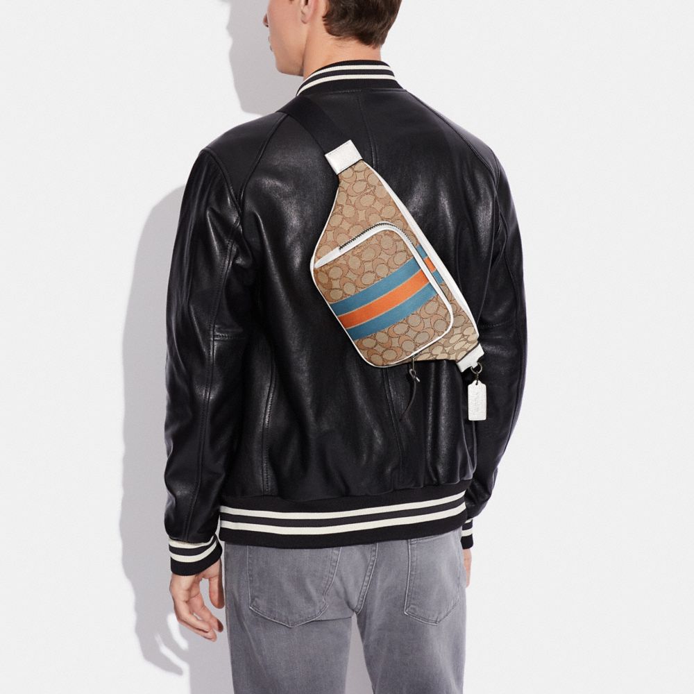 THOMPSON BELT BAG IN SIGNATURE JACQUARD WITH VARSITY STRIPE