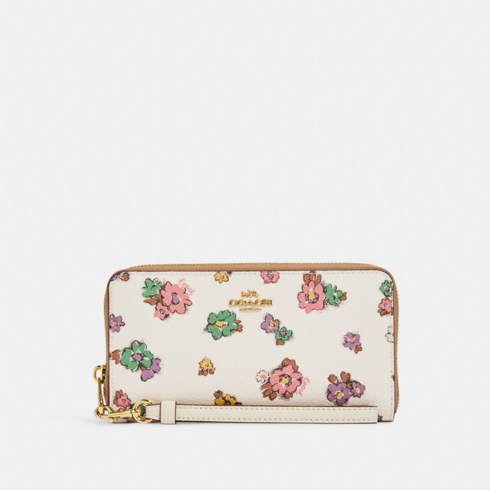 LONG ZIP AROUND WALLET WITH SPACED FLORAL FIELD PRINT