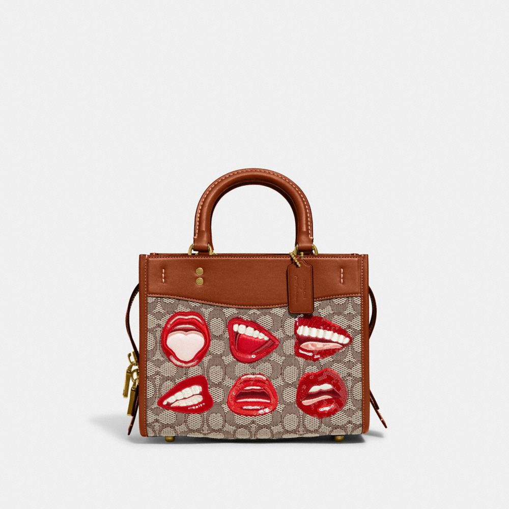 COACH CA119 Coach X Tom Wesselmann Rogue 25 In Signature Textile Jacquard BRASS/COCOA BURNISHED AMB