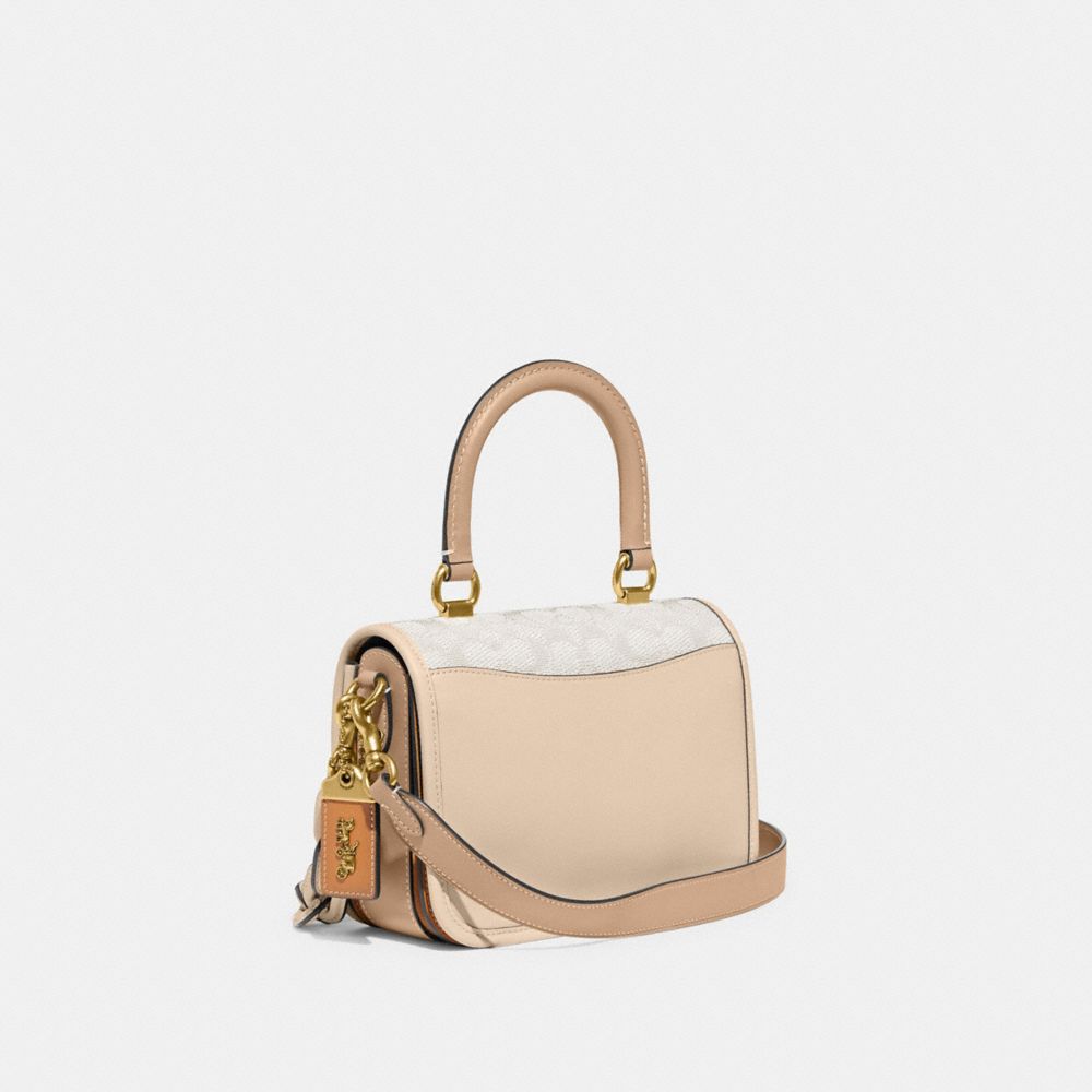 ROGUE TOP HANDLE IN SIGNATURE JACQUARD