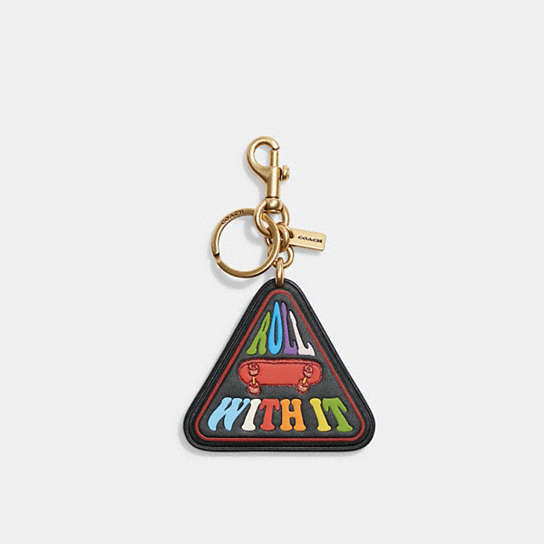 CA337 - Bag Charm In Rainbow Signature Canvas Brass/Multi