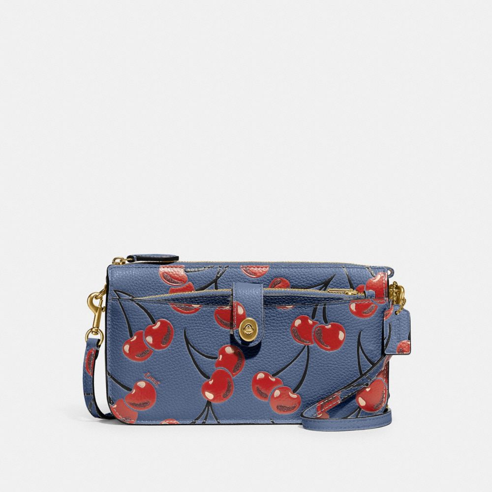 COACH CA799 Noa Pop Up Messenger With Cherry Print BRASS/WASHED CHAMBRAY