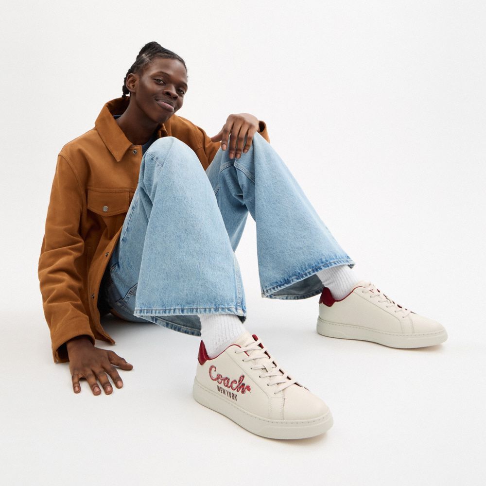 NEW YEAR HIGHLINE SNEAKER WITH COACH SNAKE SCRIPT