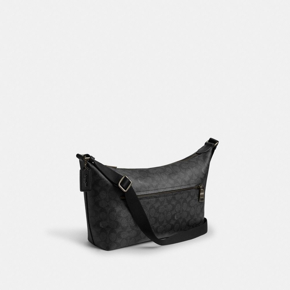 FINN CROSSBODY BAG IN SIGNATURE CANVAS