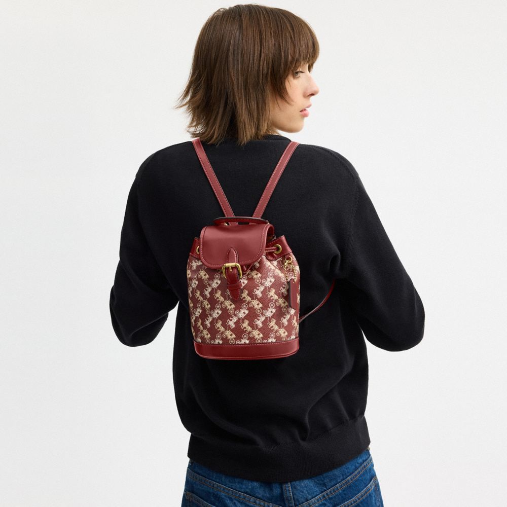 HARPER BACKPACK WITH HORSE AND CARRIAGE PRINT