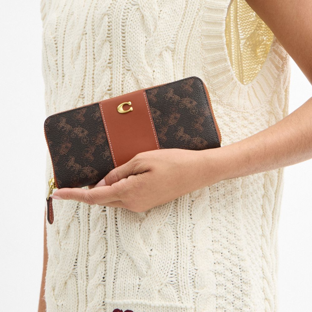 ESSENTIAL SLIM ACCORDION ZIP WALLET WITH HORSE AND CARRIAGE PRINT