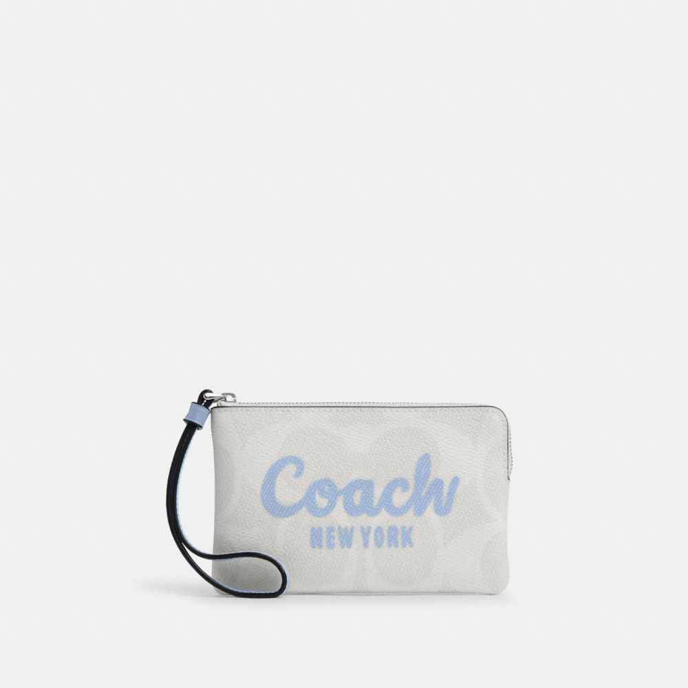 Corner Zip Wristlet In Signature Canvas With Coach Script - CAQ74 - Sv/Chalk/Bluebell