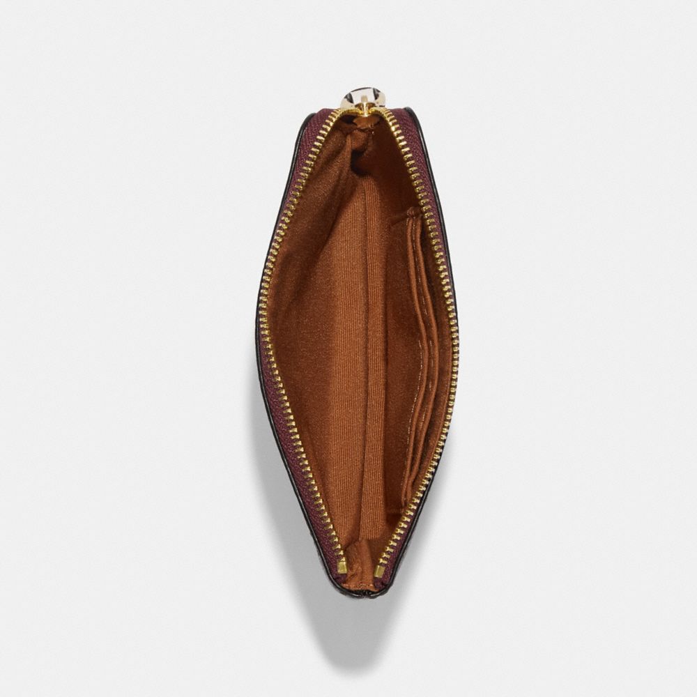 CORNER ZIP WRISTLET IN SIGNATURE CANVAS WITH VARSITY MOTIF