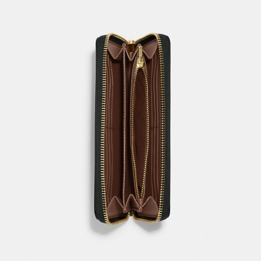 LONG ZIP AROUND WALLET IN SIGNATURE CANVAS WITH VARSITY MOTIF