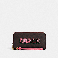 COACH CB856 Long Zip Around Wallet In Signature Canvas With Varsity Motif IM/BROWN/WATERMELON