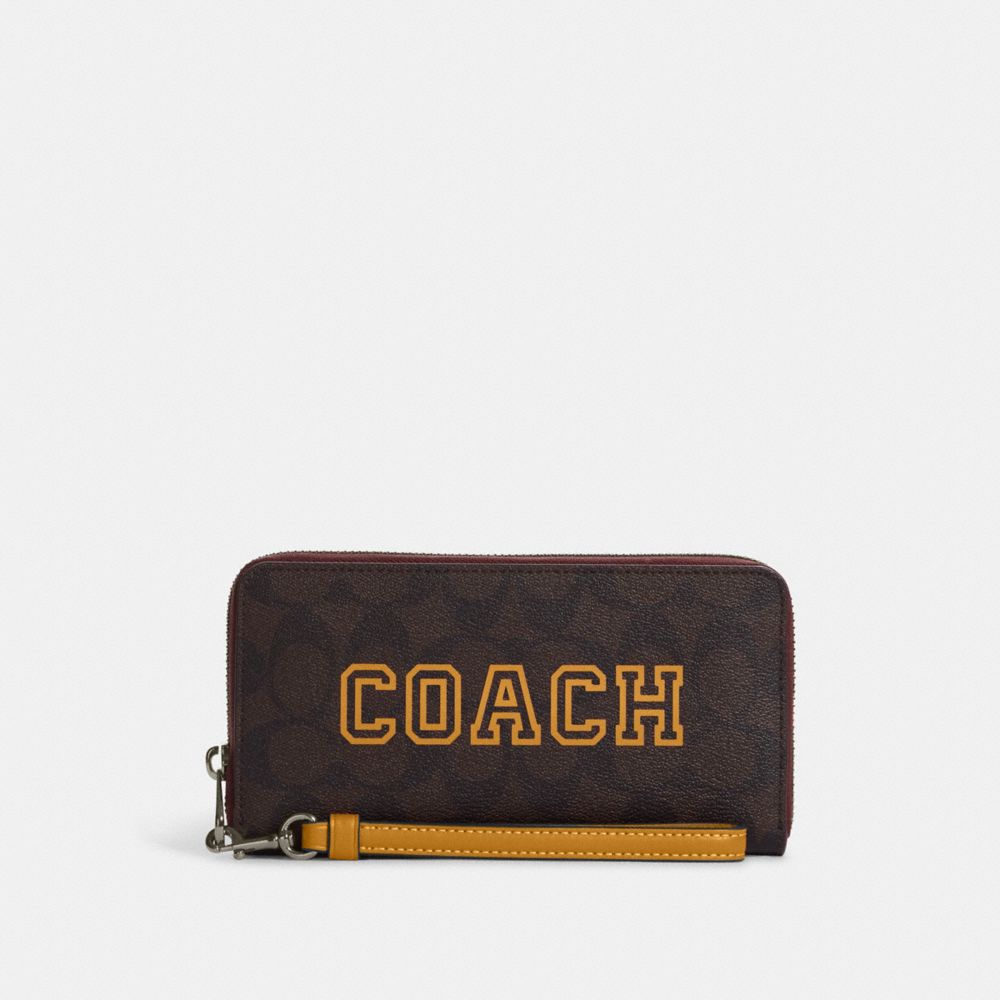 Long Zip Around Wallet In Signature Canvas With Varsity Motif - CB856 - QB/Brown/Buttercup