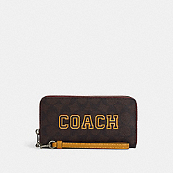 COACH CB856 Long Zip Around Wallet In Signature Canvas With Varsity Motif QB/BROWN/BUTTERCUP