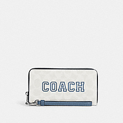 COACH CB856 Long Zip Around Wallet In Signature Canvas With Varsity Motif SV/CHALK/INDIGO