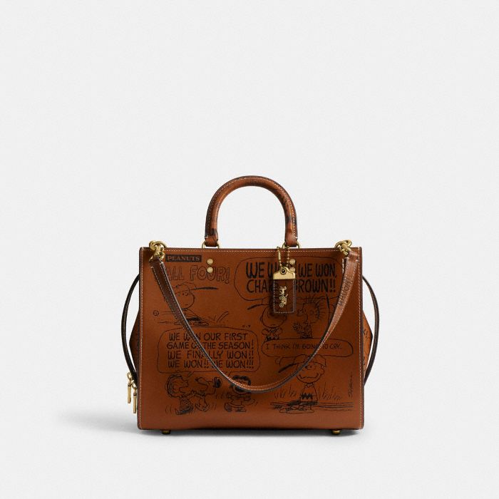 COACH X PEANUTS NEWSPAPER PRINT ROGUE BAG