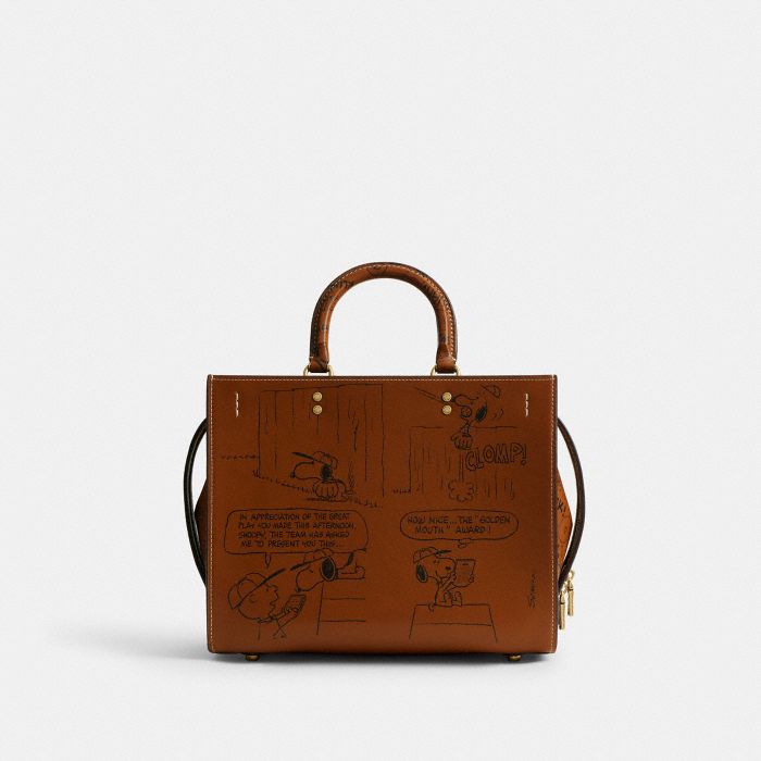COACH X PEANUTS NEWSPAPER PRINT ROGUE BAG