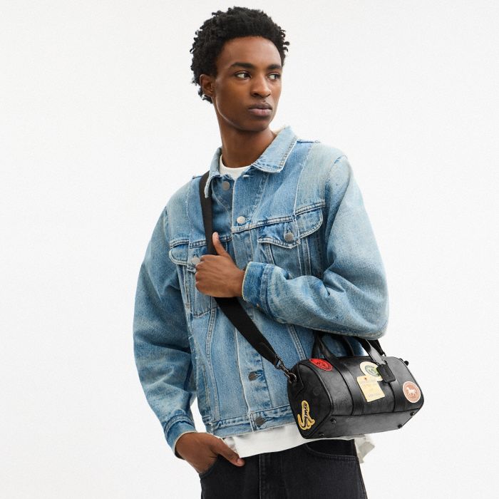 GOTHAM DUFFLE BAG 24 IN SIGNATURE CANVAS WITH PATCHES