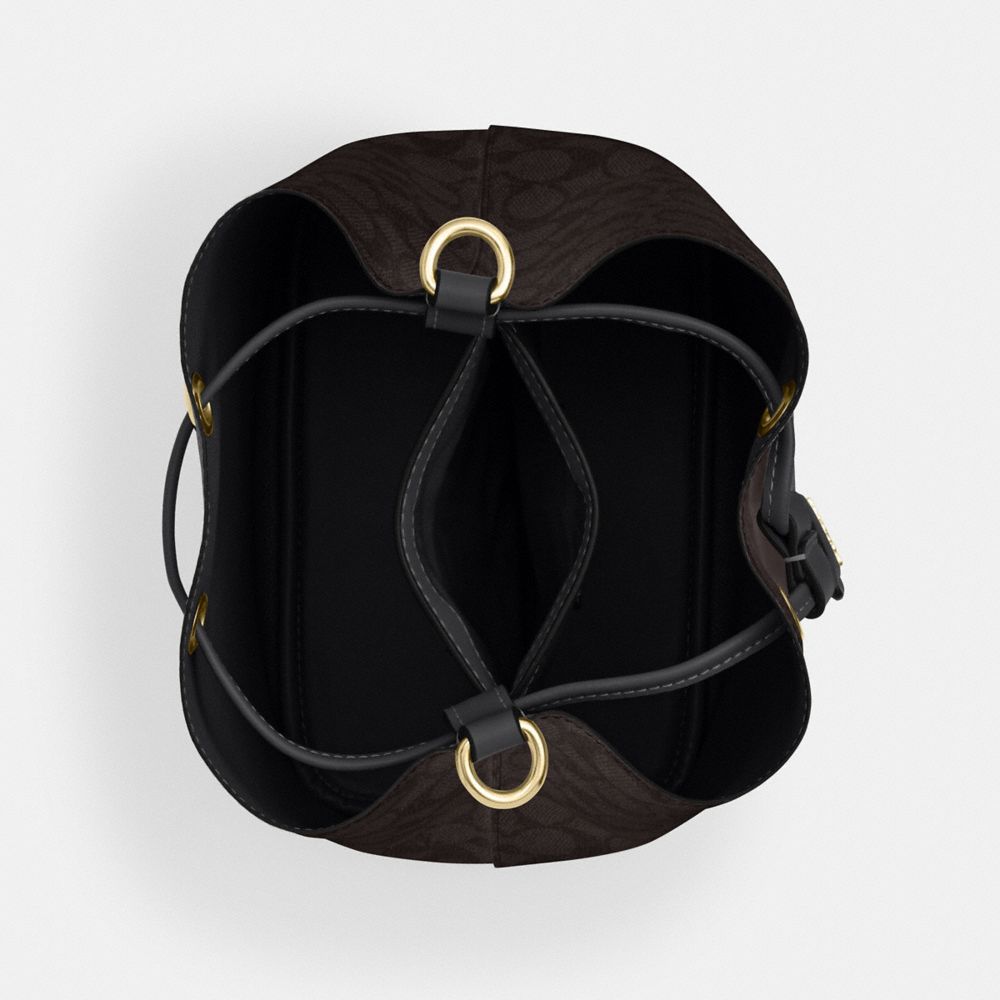 ROWAN BUCKET BAG IN SIGNATURE CANVAS