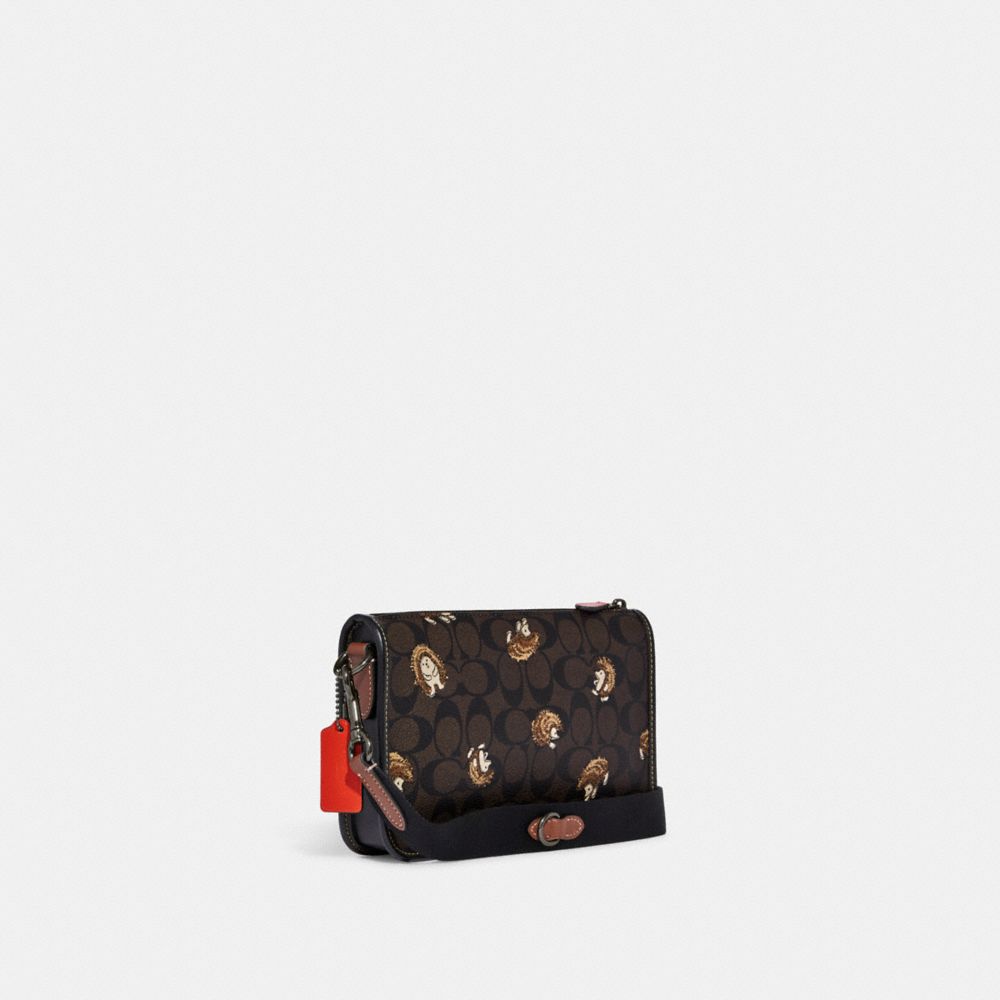 HERITAGE CONVERTIBLE CROSSBODY IN SIGNATURE CANVAS WITH CREATURE PRINT