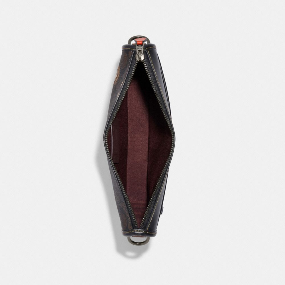 HERITAGE CONVERTIBLE CROSSBODY IN SIGNATURE CANVAS WITH CREATURE PRINT