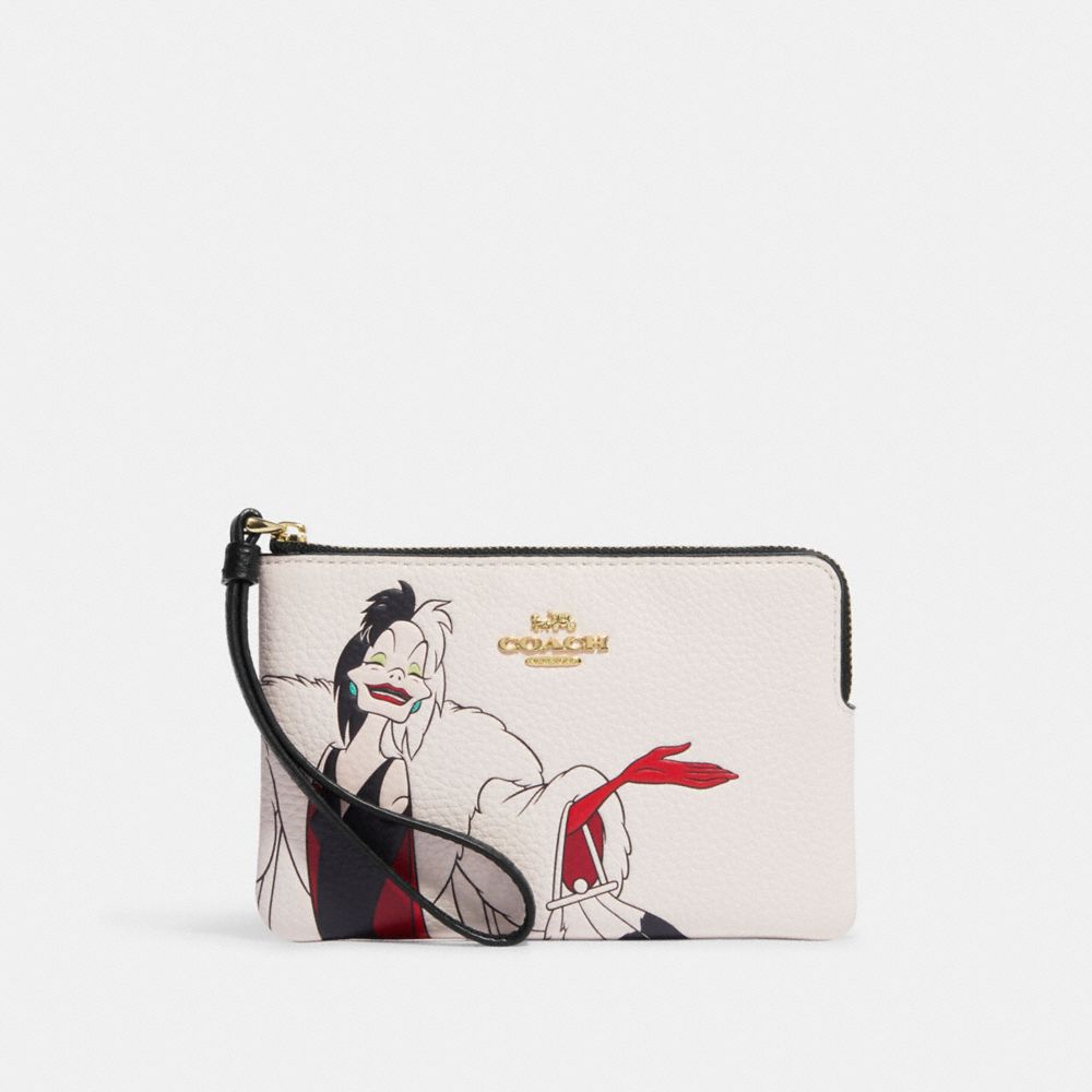 Disney X Coach Corner Zip Wristlet With Cruella Motif - CC334 - Gold/Chalk Multi