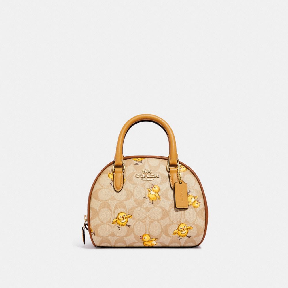 Sydney Satchel In Signature Canvas With Tossed Chick Print - CC427 - Gold/Light Khaki Multi