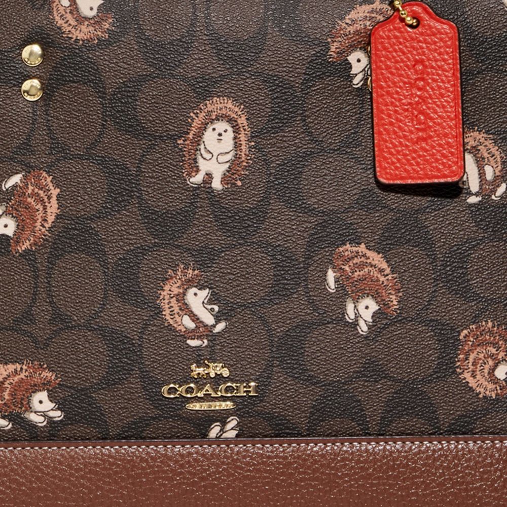 DEMPSEY CARRYALL IN SIGNATURE CANVAS WITH HEDGEHOG PRINT