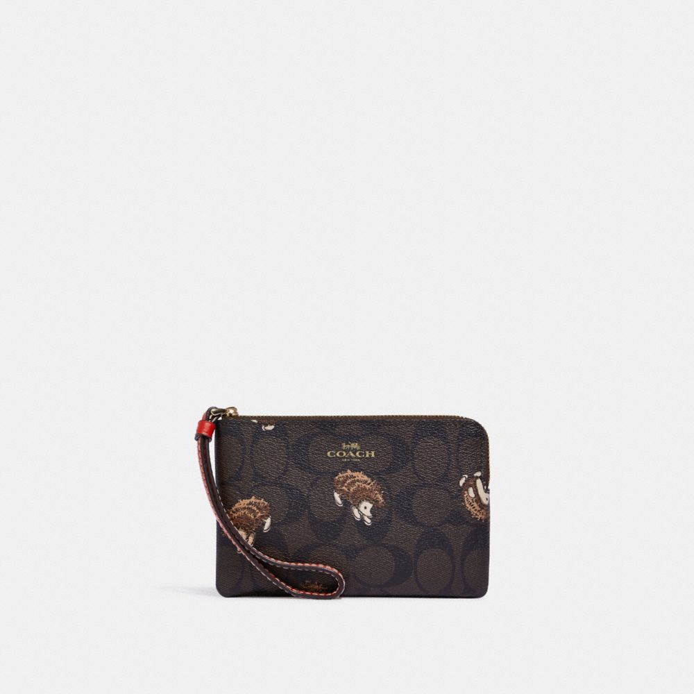 Corner Zip Wristlet In Signature Canvas With Hedgehog Print - CC433 - Gold/Brown Black Multi