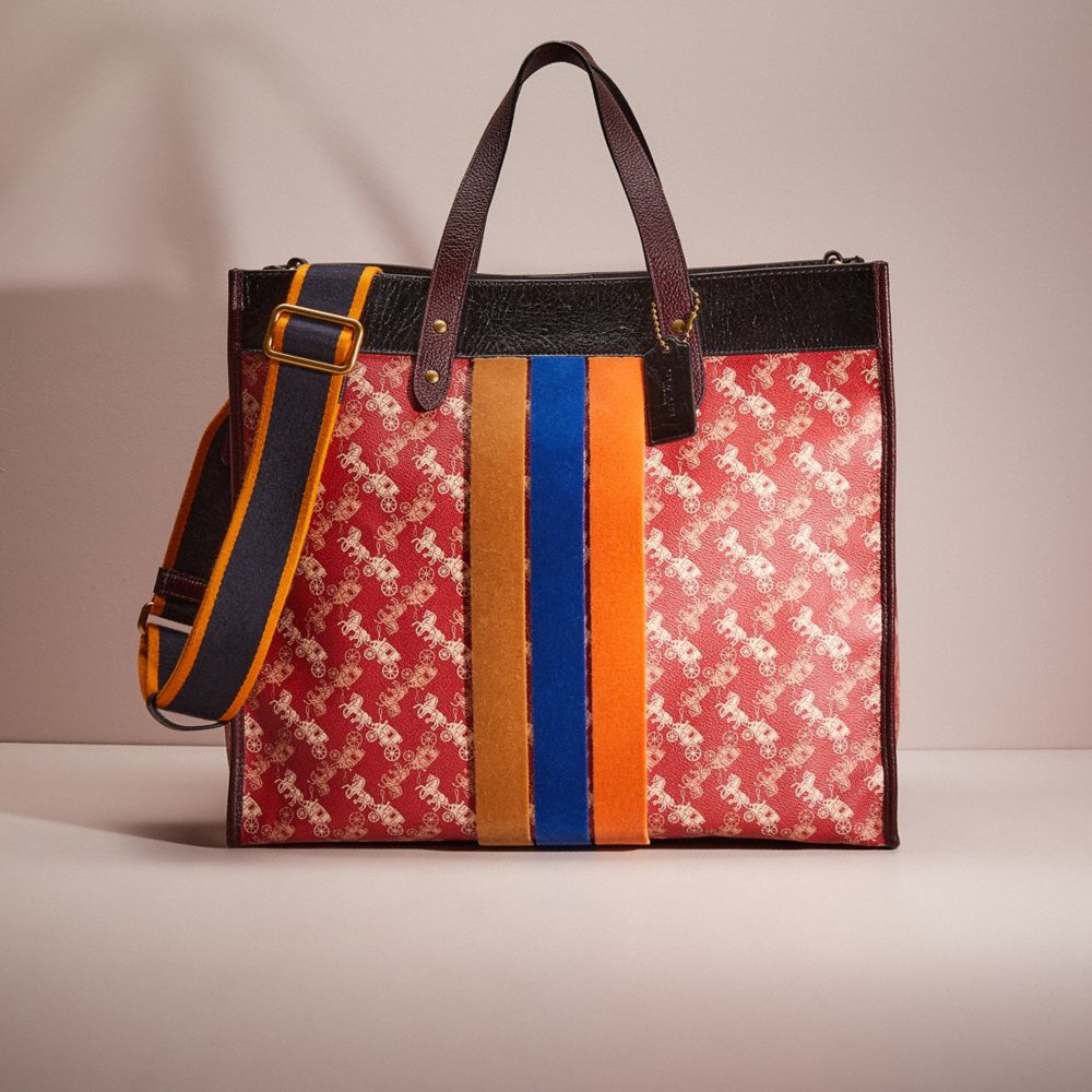 CC665 - Restored Field Tote 40 With Horse And Carriage Print And Varsity Stripe Brass/Red Black Multi