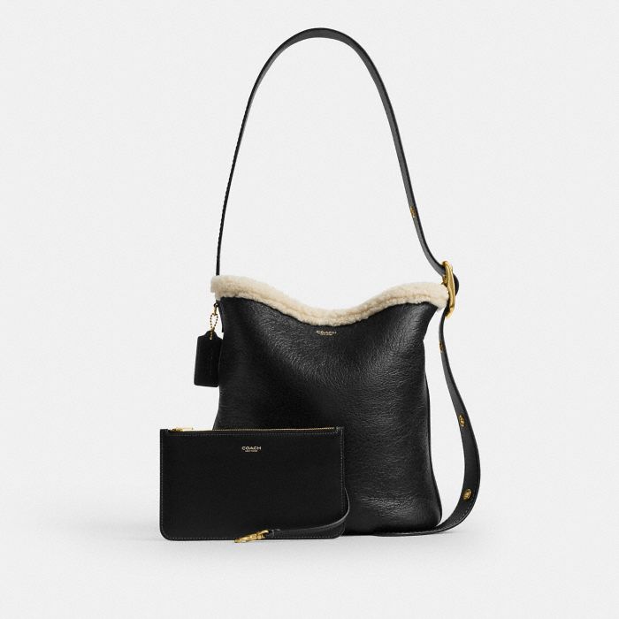 BLEECKER BUCKET BAG IN SHEARLING