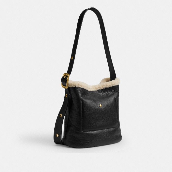 BLEECKER BUCKET BAG IN SHEARLING
