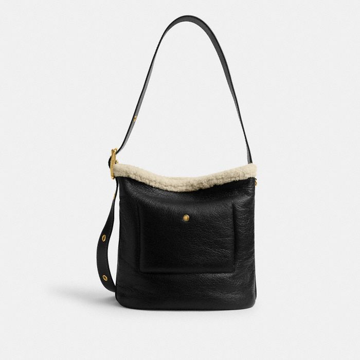 BLEECKER BUCKET BAG IN SHEARLING