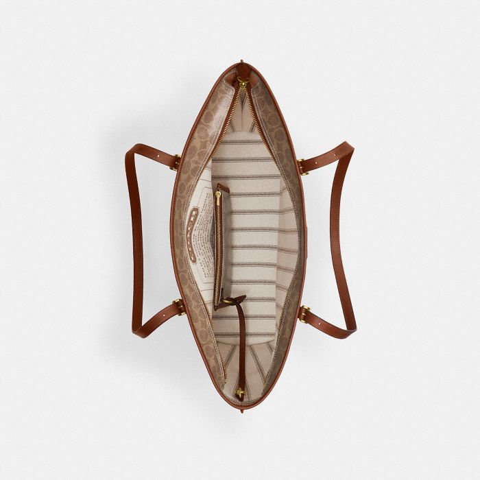 TAXI TOTE BAG IN SIGNATURE CANVAS