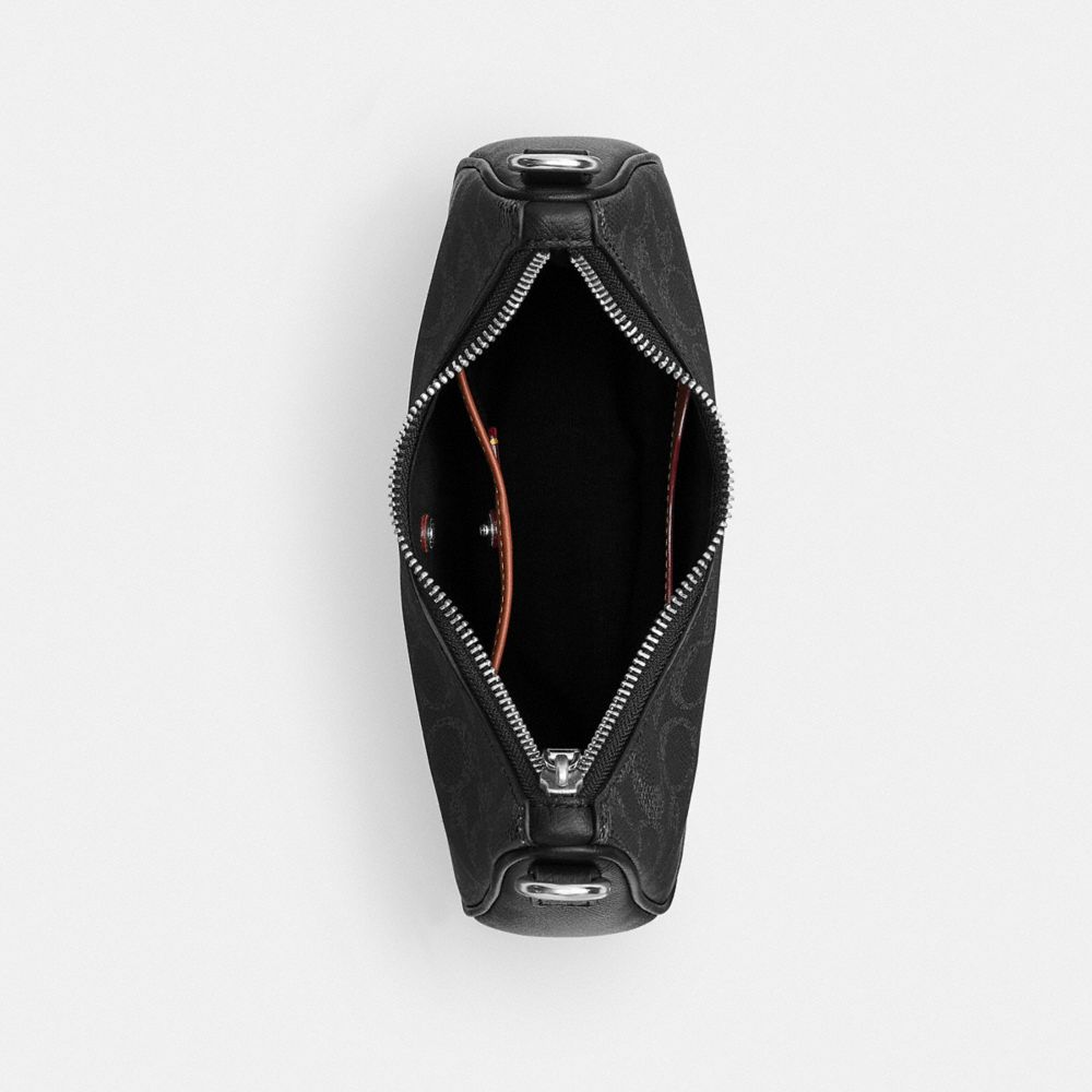 NOLAN HOBO BAG IN SIGNATURE CANVAS